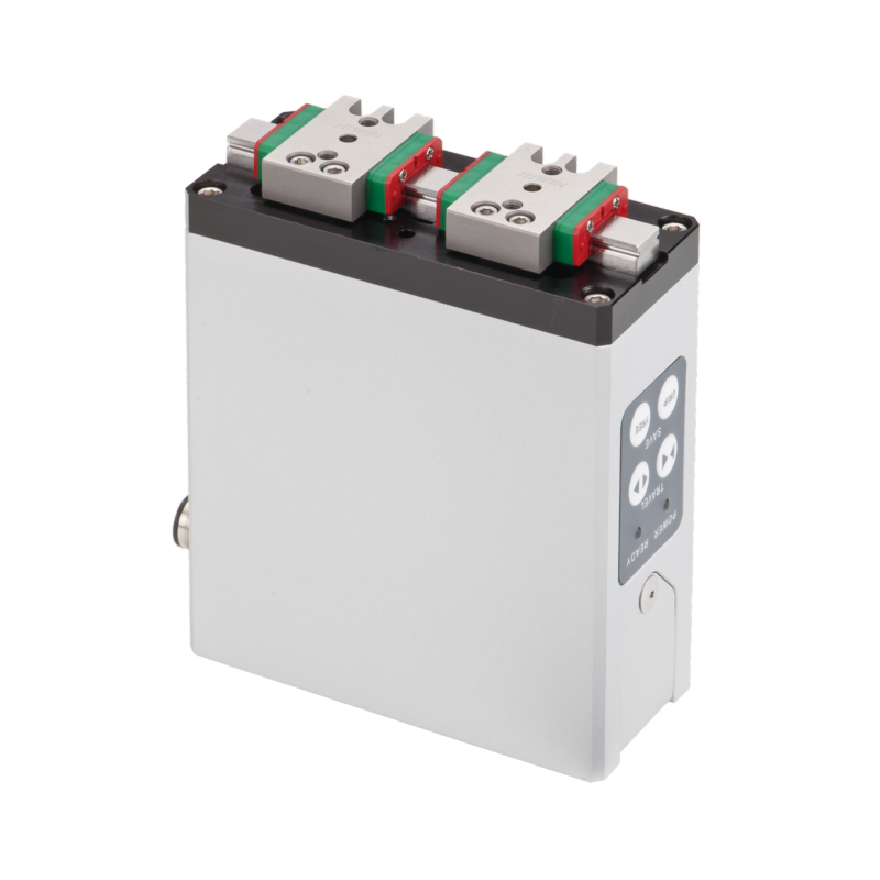 A rectangular metal device with two sliding mechanical clamps on top and a side panel featuring four round buttons labeled 1, 2, 3, and 4, positioned against a plain white background.